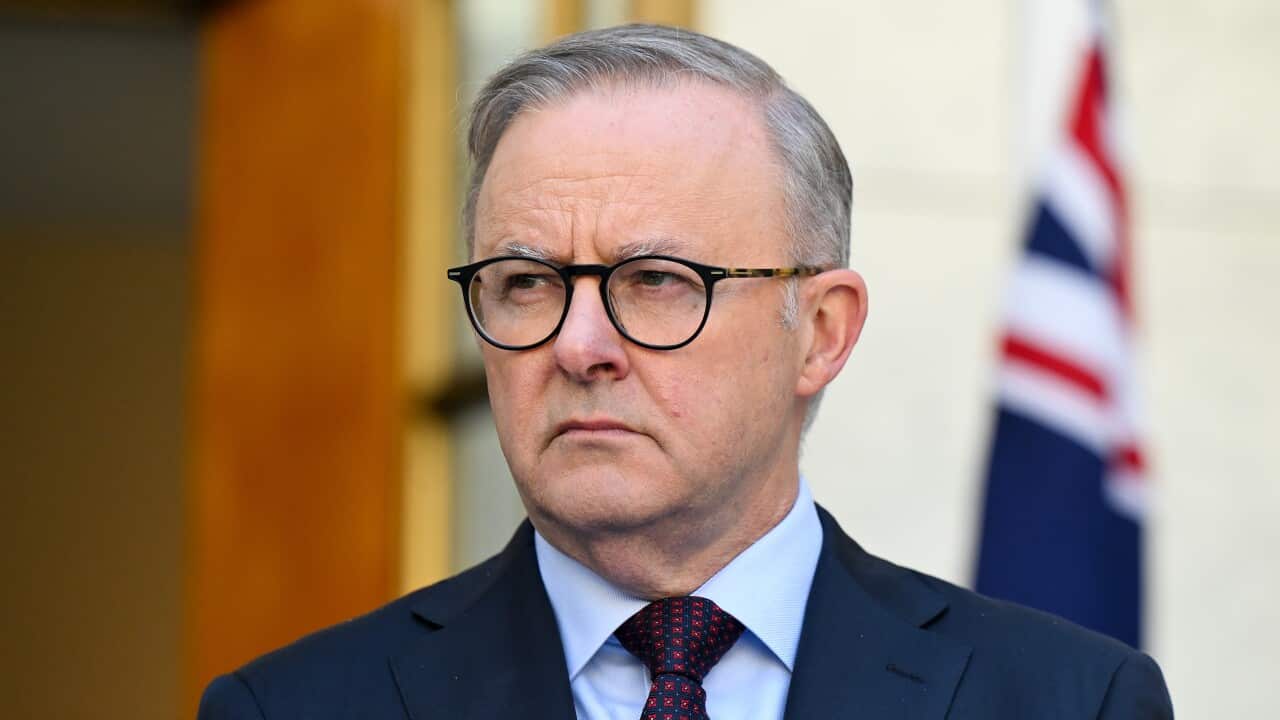 A man wearing glasses