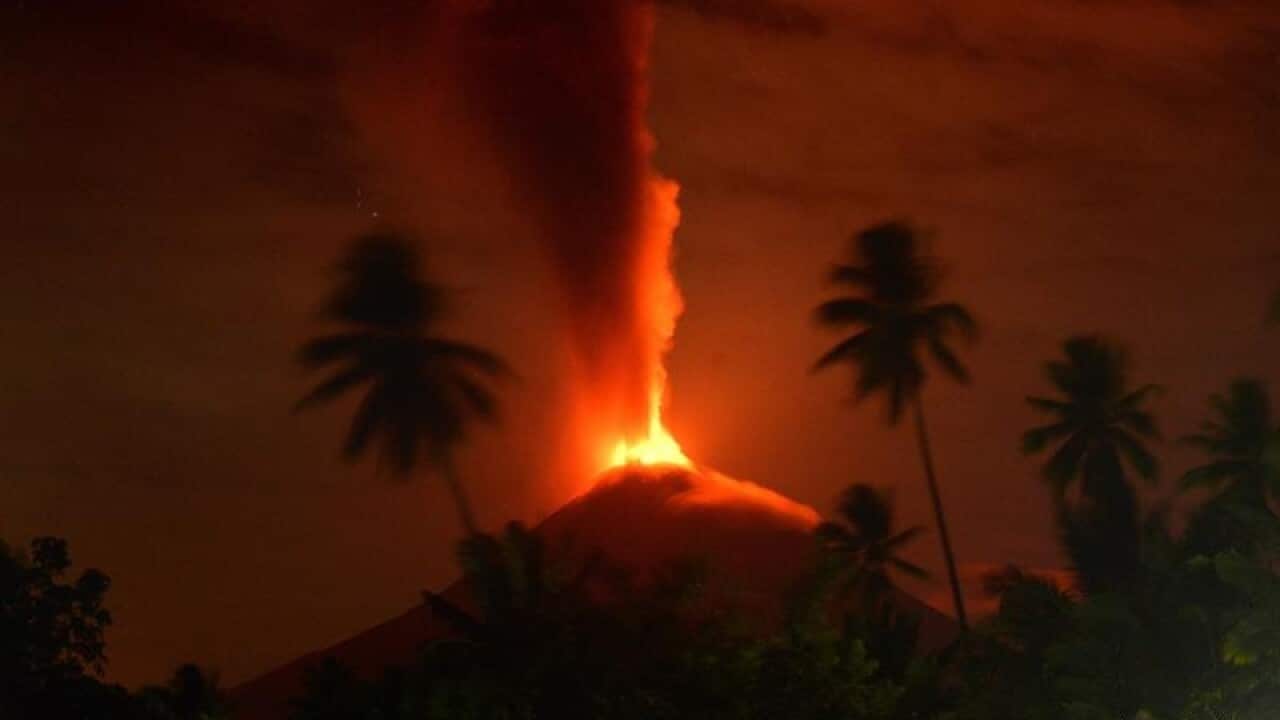Mount Soputan erupting