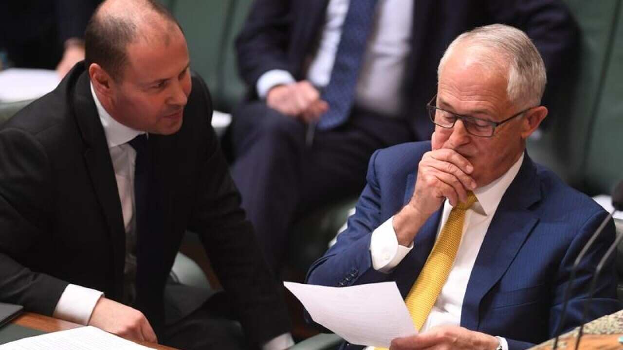 Malcolm Turnbull and Josh Frydenberg in parliament