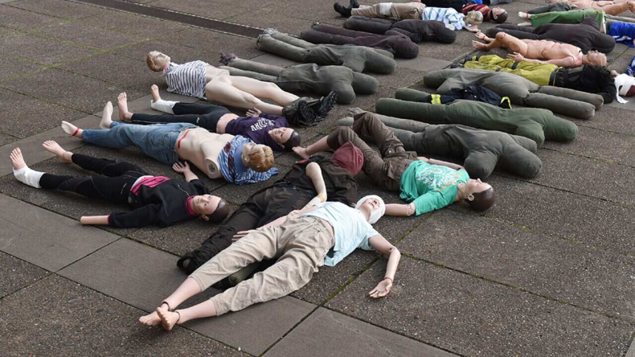 Mannequins lay on the ground