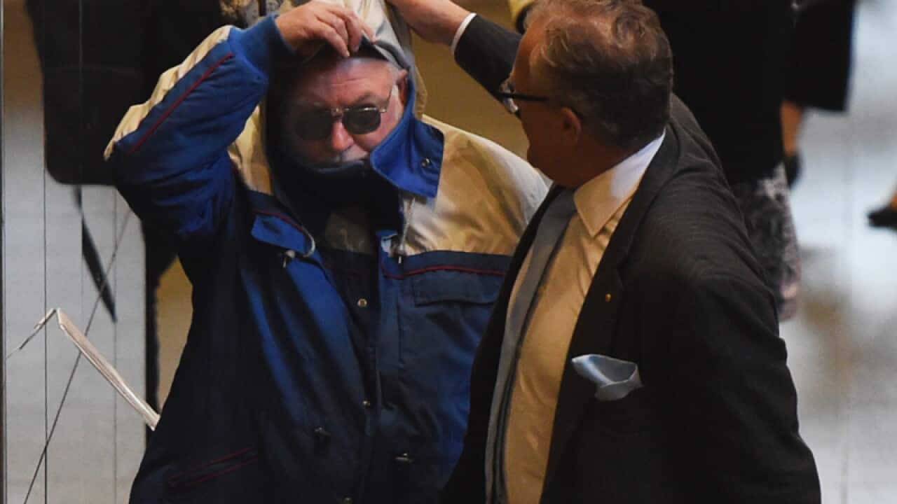 Convicted sex offender Gregory Sutton (L)