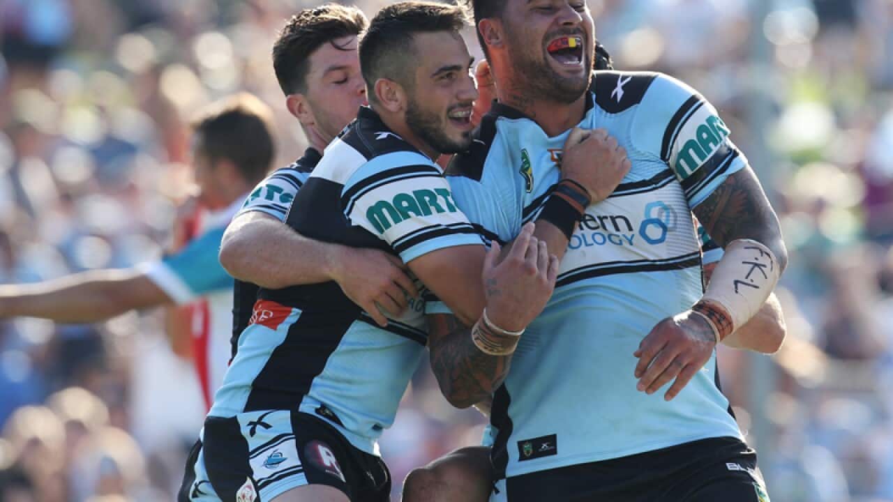 Cronulla Sutherland Sharks players celebrate