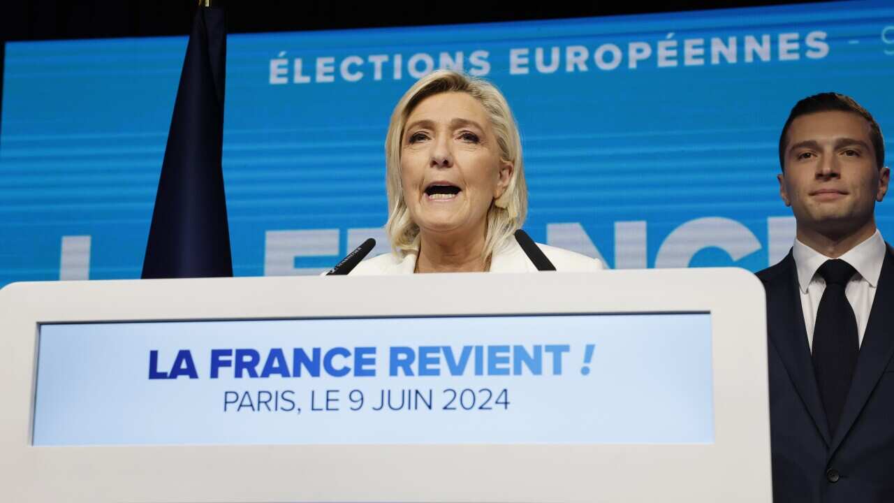 National Rally parliamentary party leader Marine Le Pen delivers a speech next to leader Jordan Bardella at the electoral party of the French right-wing party National Rally in Paris, France, 09 June 2024.