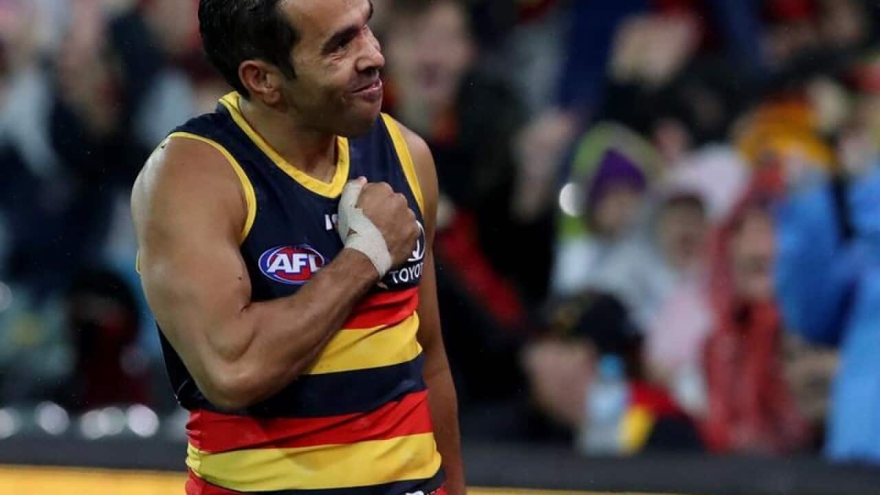 Adelaide Crows player Eddie Betts celebrates after kicking a goal
