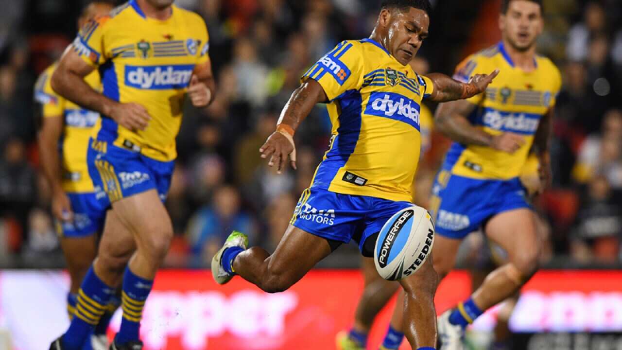 Parramatta's Chris Sandow kicks the ball