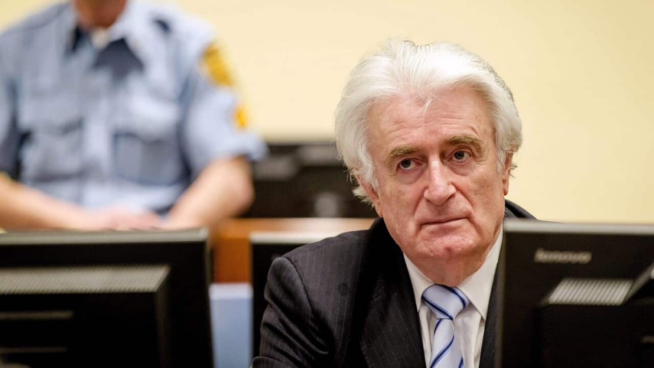 Bosnian Serb wartime leader Radovan Karadzic sits in the courtroom for the reading of his verdict at the International Criminal Tribunal in 2016.