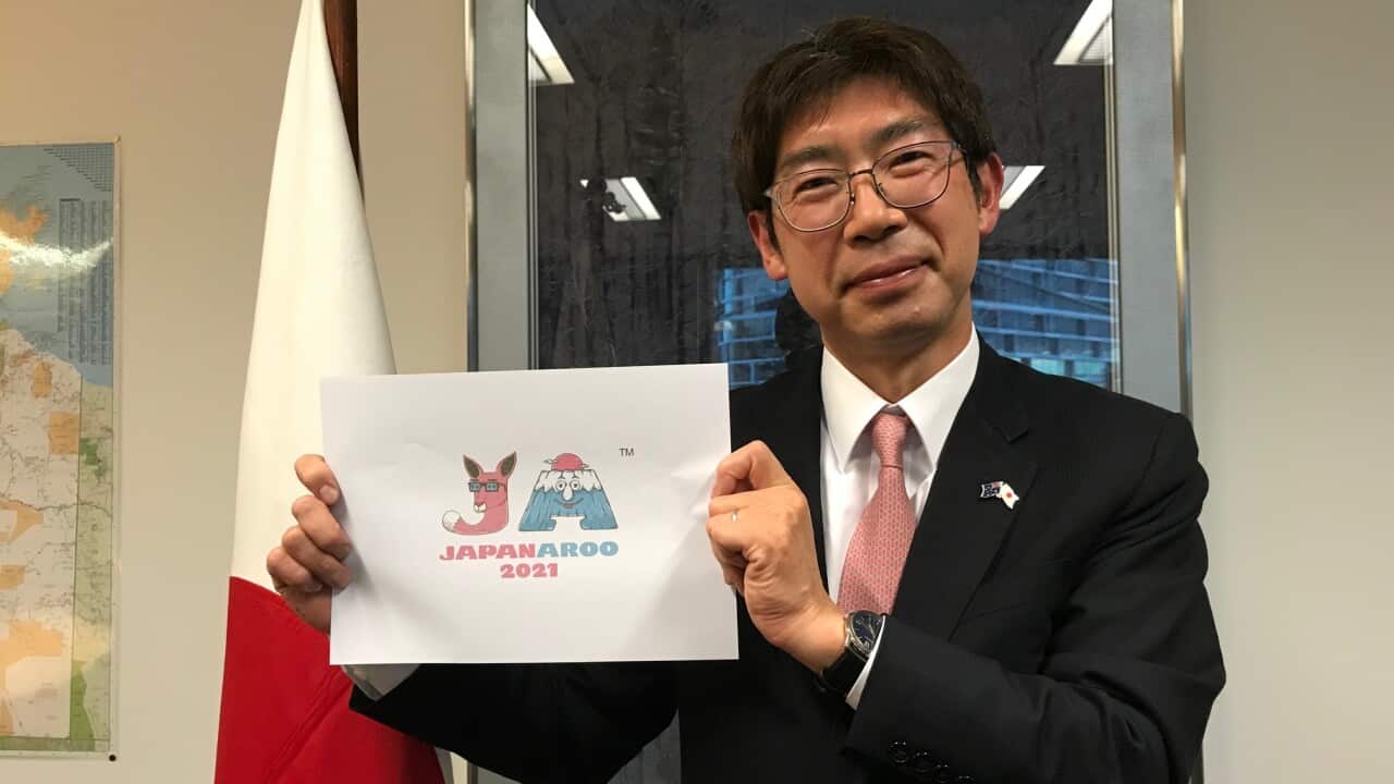 Consul-General of Japan in Sydney Masahiko Kiya holds the logo of Japanaroo, an inaugural Japanese festival held in August in Sydney for 10 days.