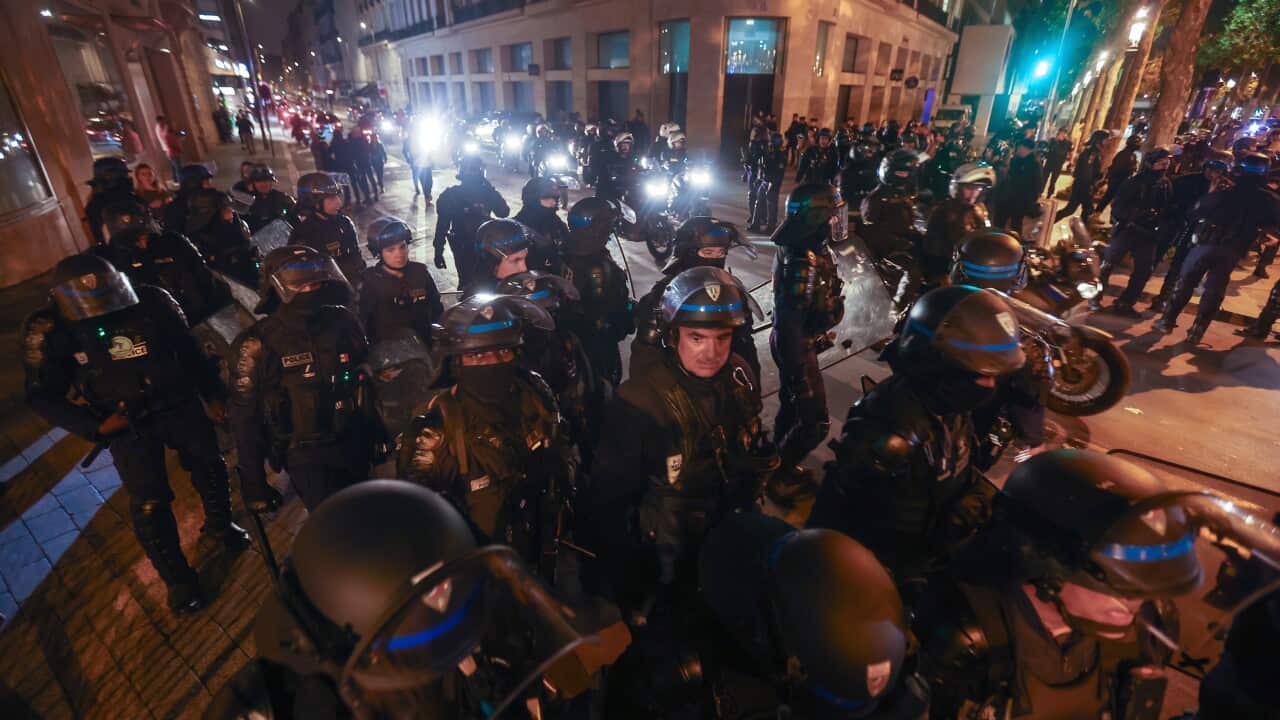 Police patrol the streets of Paris after four nights of violent protests.