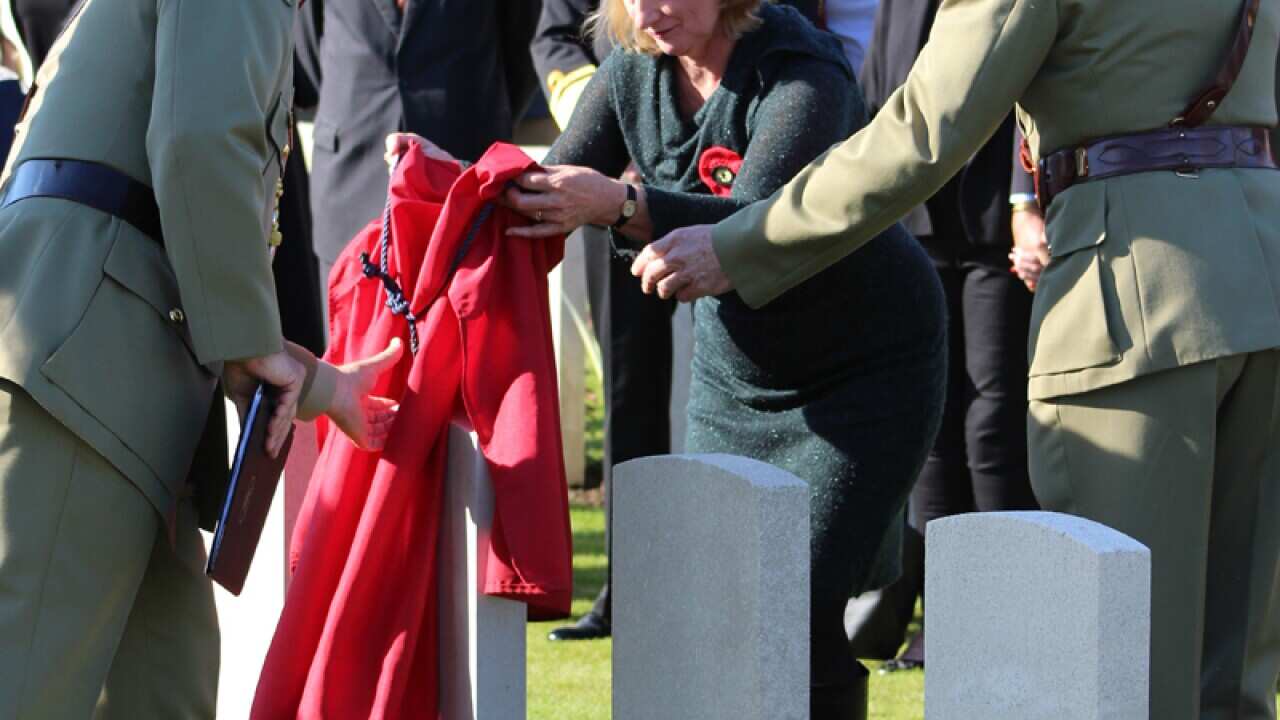 Lisa Mahony unveils the headstone for her great uncle Henry Huntsman