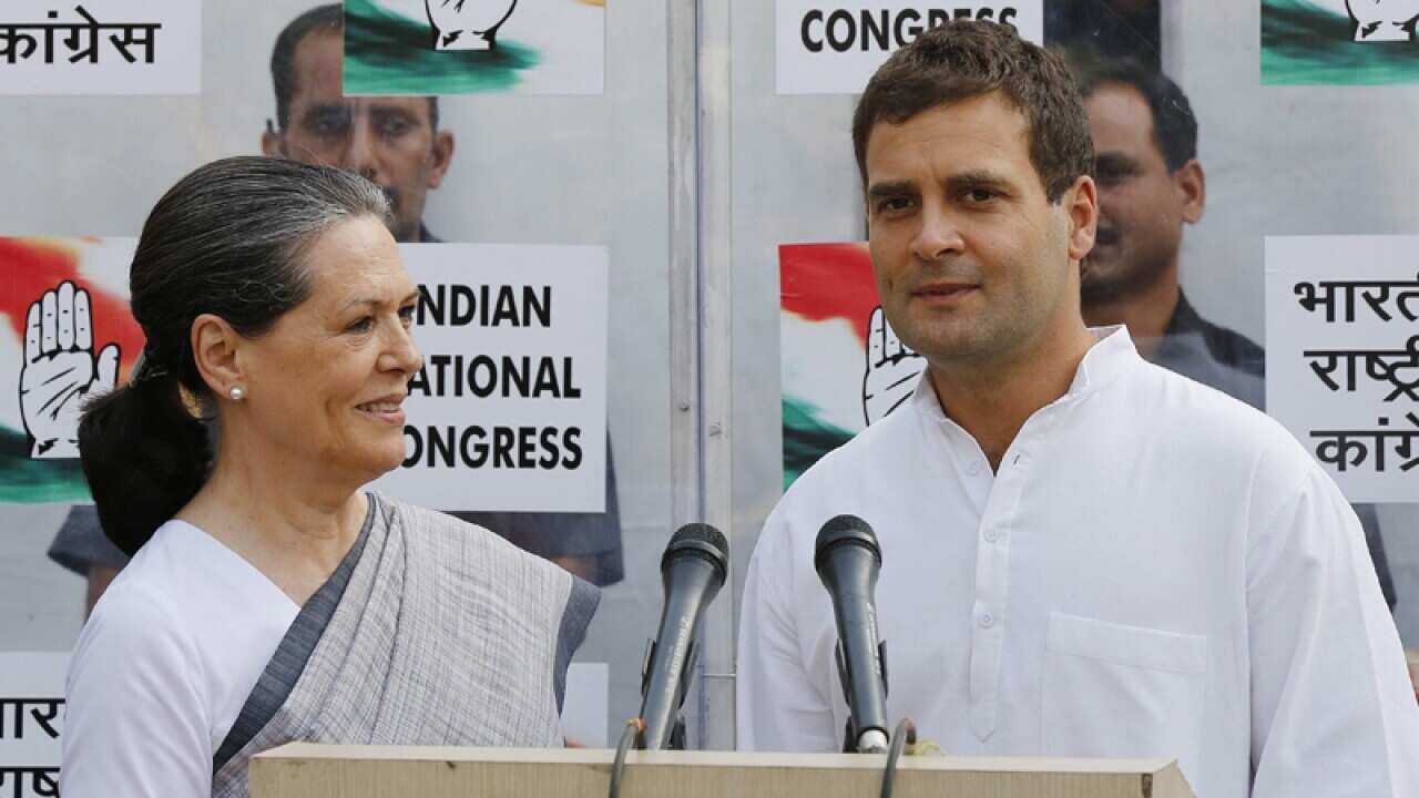 India's Congress party's Sonia (L) and Rahul Gandhi