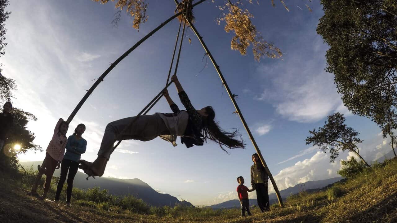A representative image. Children play on a bamboo swing in Kathmandu during the Dashain festival in Kathmandu, Nepal, 9 October 2016.