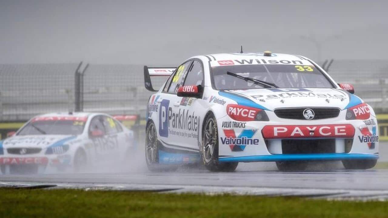 Garth Tander drives his Holden Commodore VF