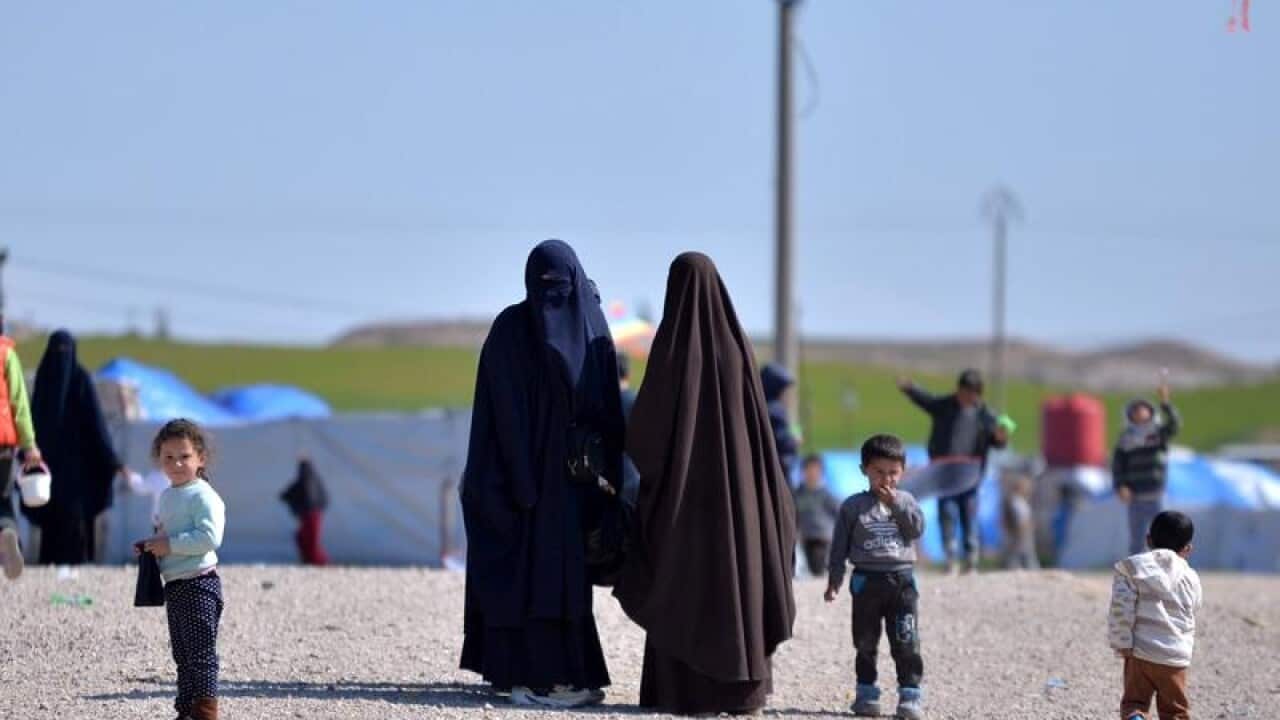 women and children at refugee camp in Syria.