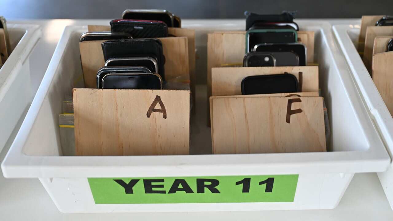 CHRIS MINNS SCHOOL MOBILE PHONES BAN