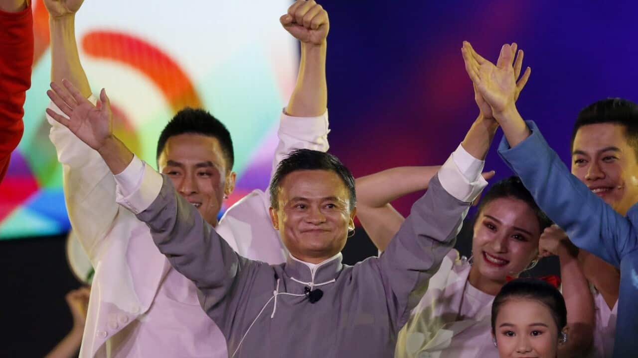 Jack Ma executive chairman of Alibaba Group waves to the audience during the closing ceremony for the 18th Asian Games in Jakarta, Indonesia, Sunday, Sept. 2, 2018. (AP Photo/Dita Alangkara)