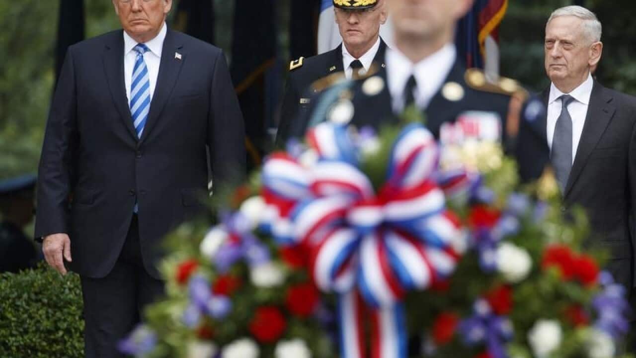 President Donald Trump arrives at Arlington Cemetery