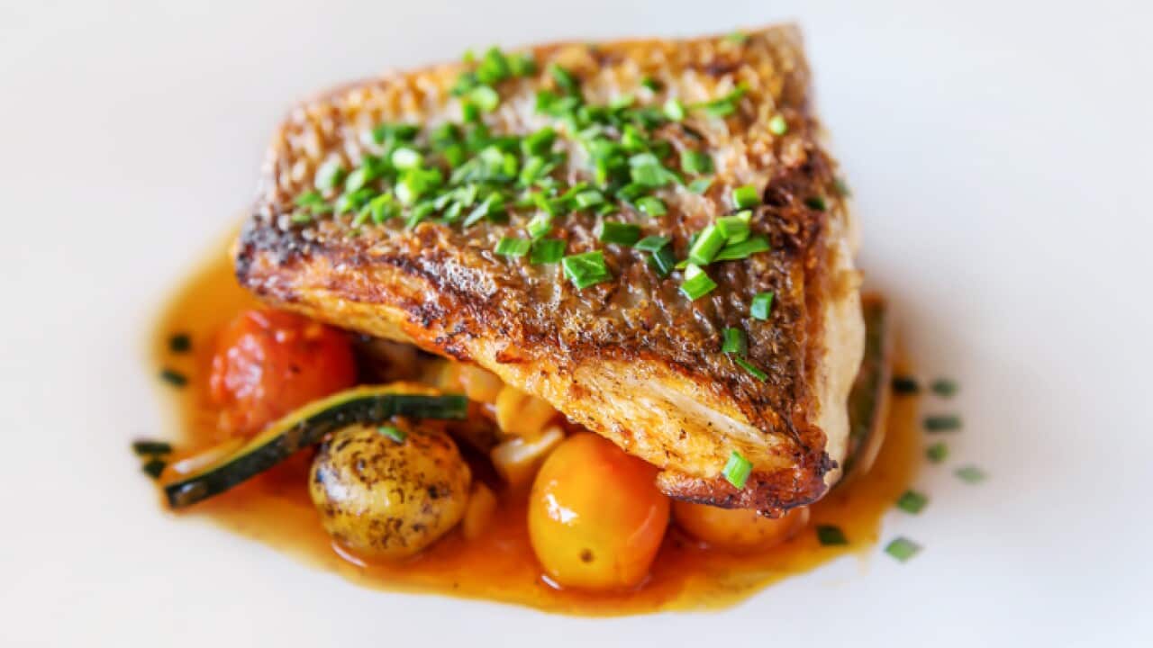 Grilled fish with fresh vegetables