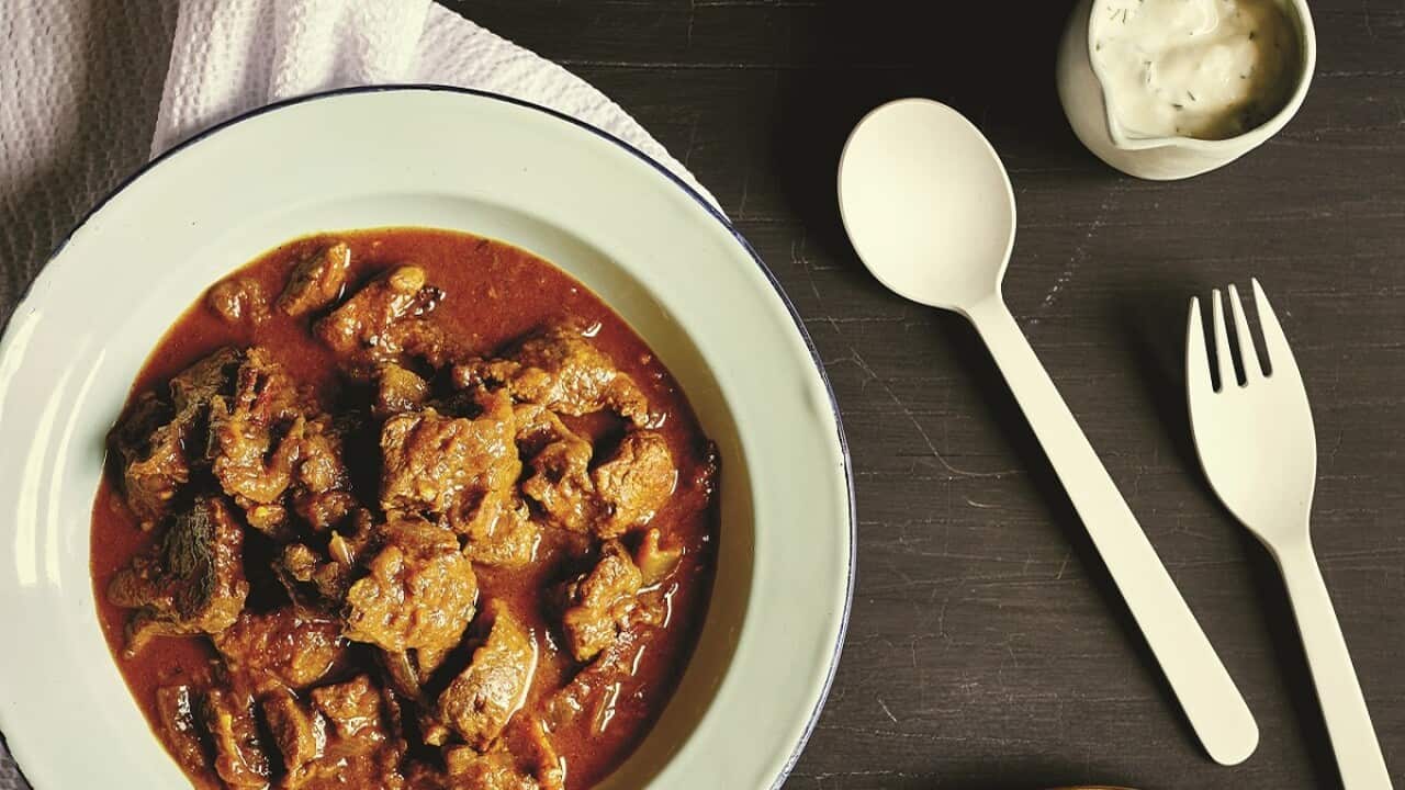 Indian-style goat curry with mint yoghurt-image