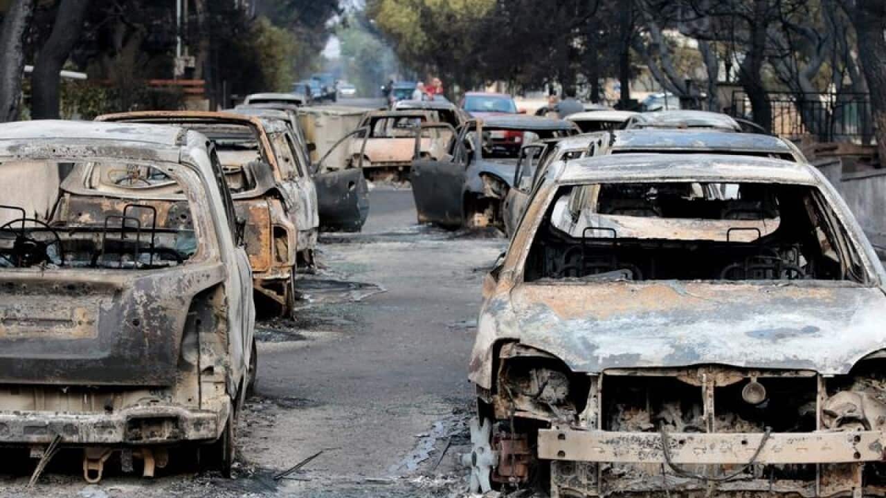Burned cars in Greece.