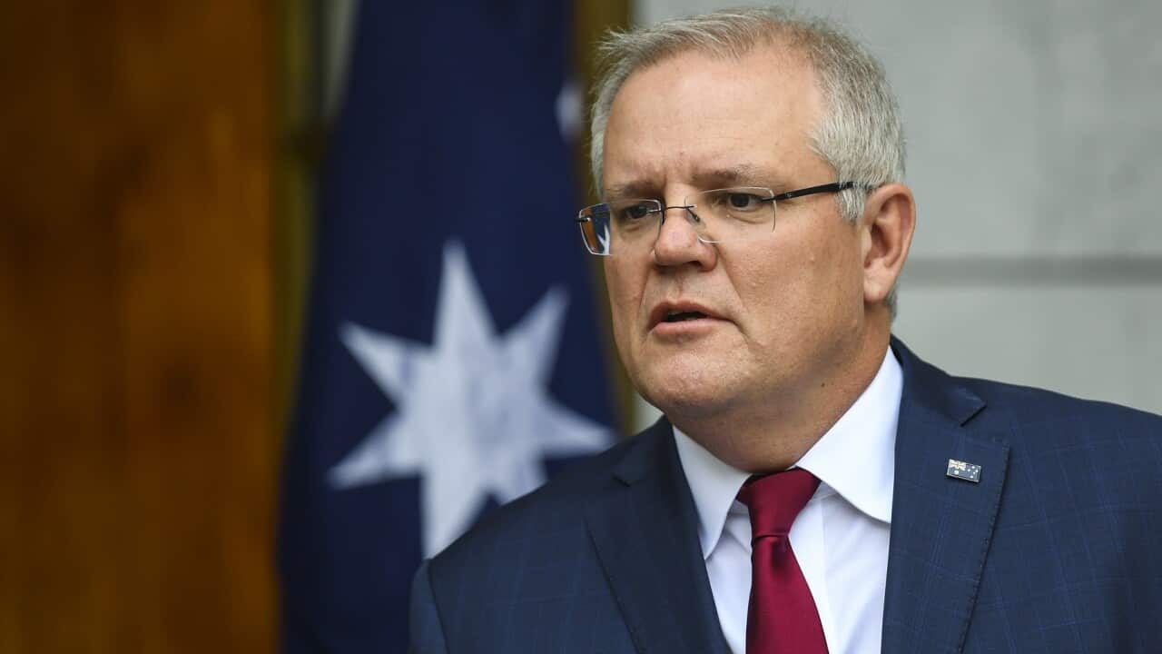 Australian Prime Minister Scott Morrison speaks to the media