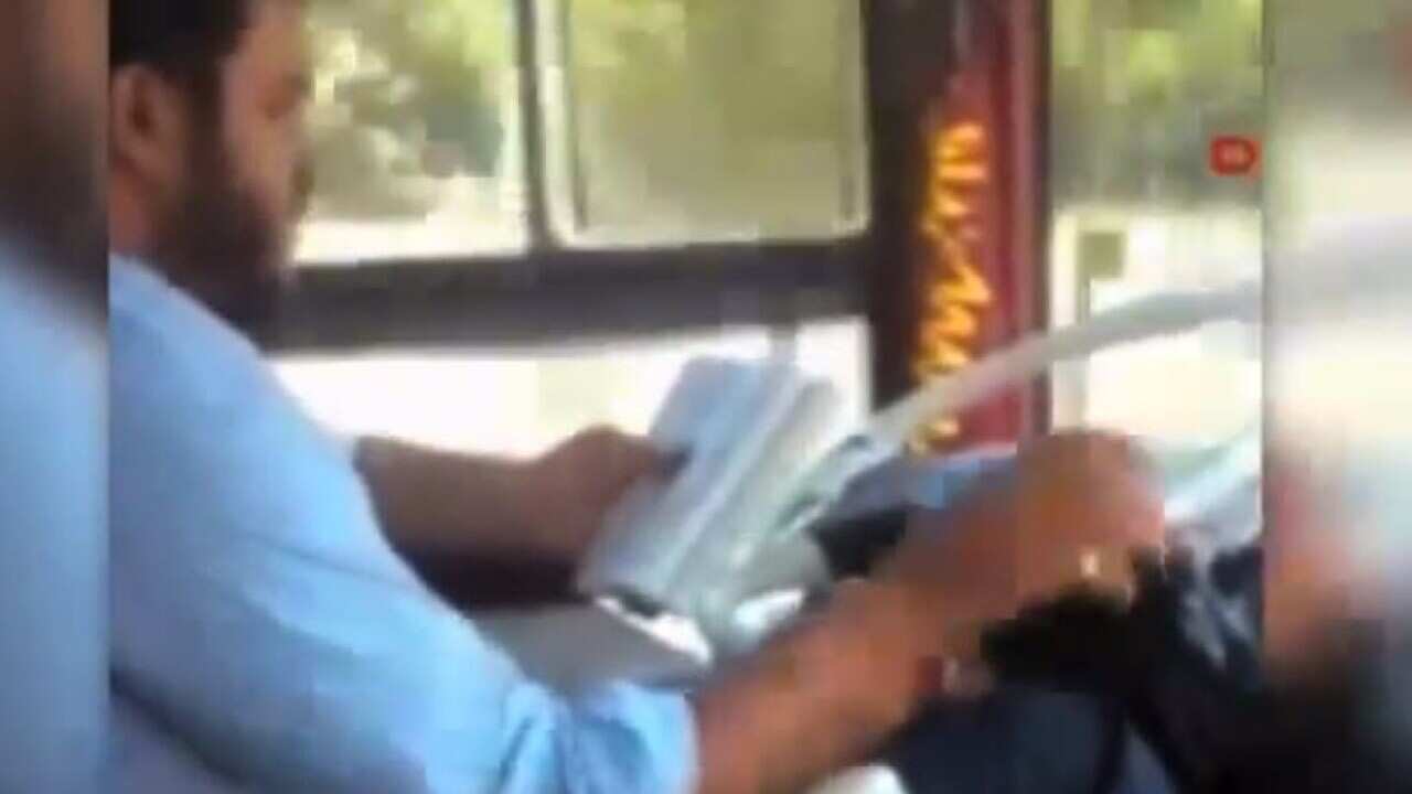An Istanbul bus driver was sacked Wednesday after video footage showed him immersed in a book while travelling at high speed on a busy street in the Turkish metropolis. (Screenshot: YouTube)