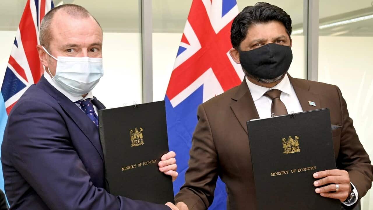 Australian High Commissioner John Feakes with Fiji's Attorney General Aiyaz Sayed Khaiyum.