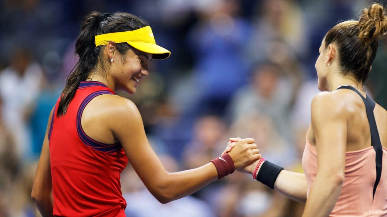 Emma Raducanu of Great Britain shakes hands with Maria Sakkari of Greece after winning their Women’s Singles semifinals match at US Open