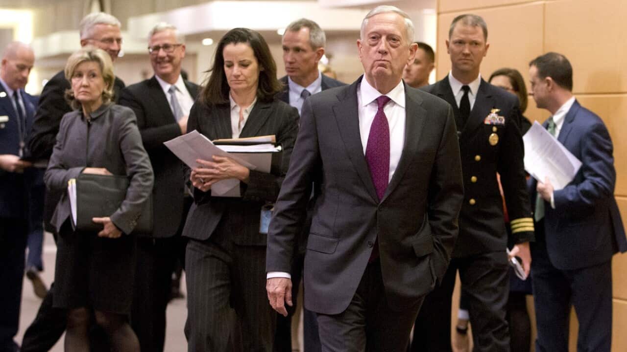 US Secretary for Defense Jim Mattis, centre right, arrives for a meeting at NATO headquarters in Brussels.