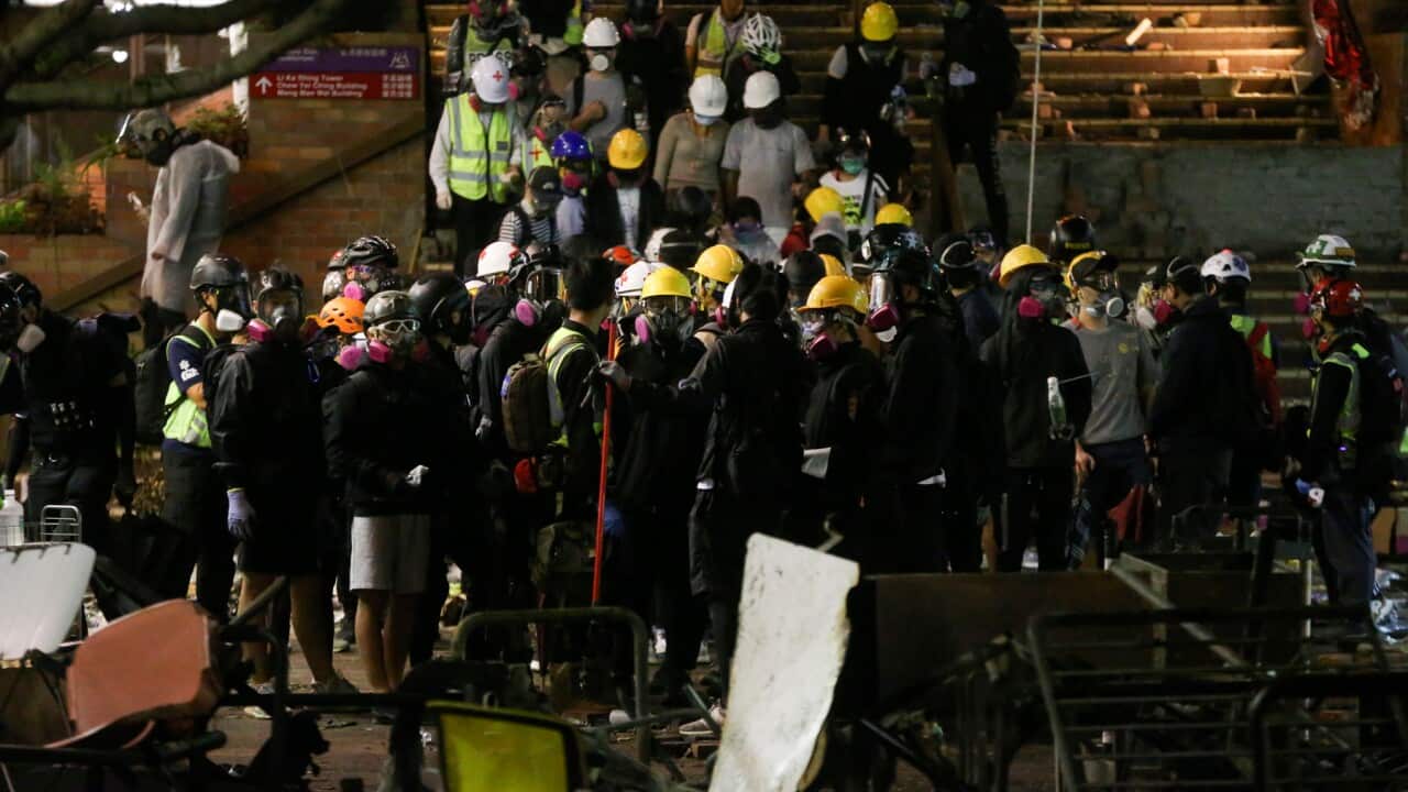 Protesters and parents gather at Hong Kong Polytechnic University campus in Hung Hom district, Hong Kong