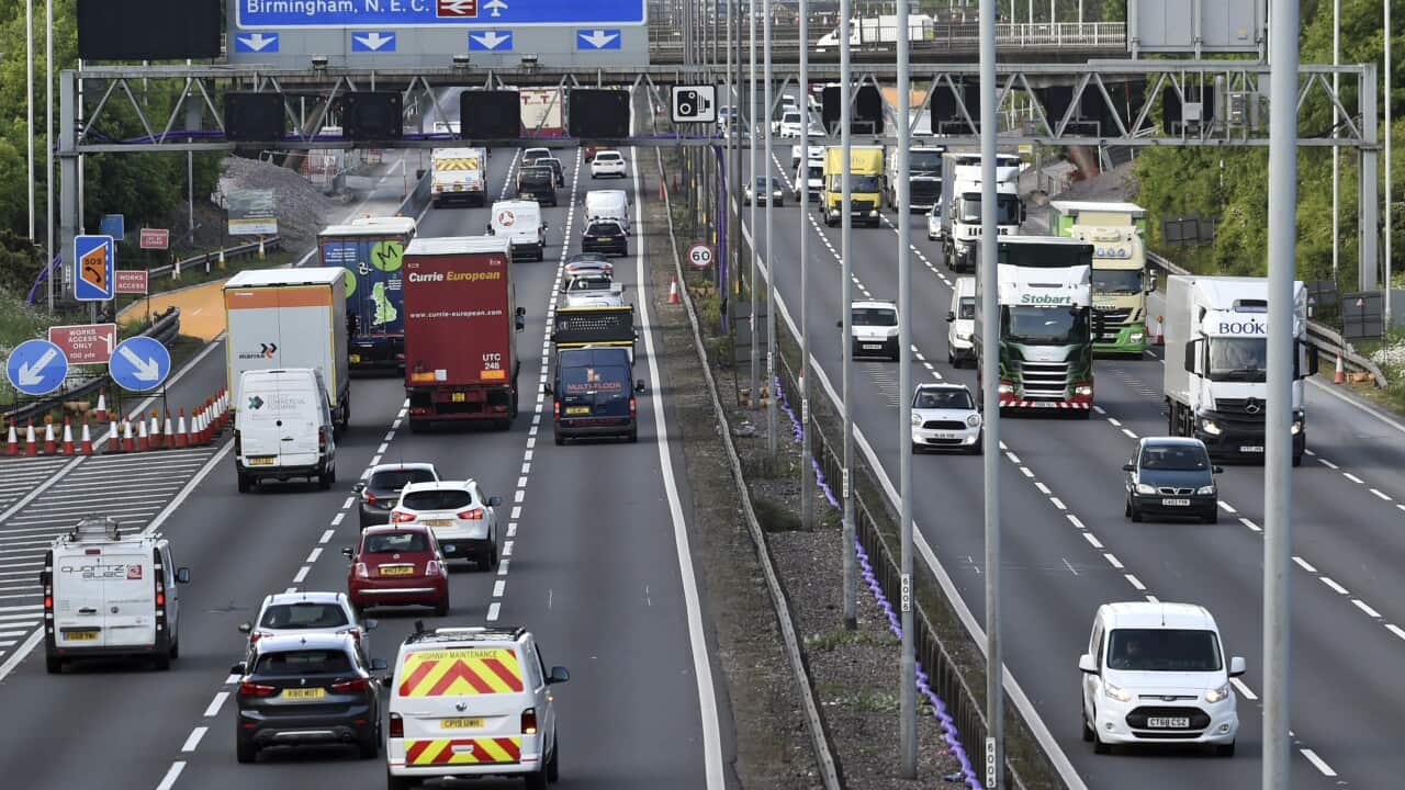 In this May 18, 2020 file photo, traffic moves along the M6 motorway near Birmingham, England.