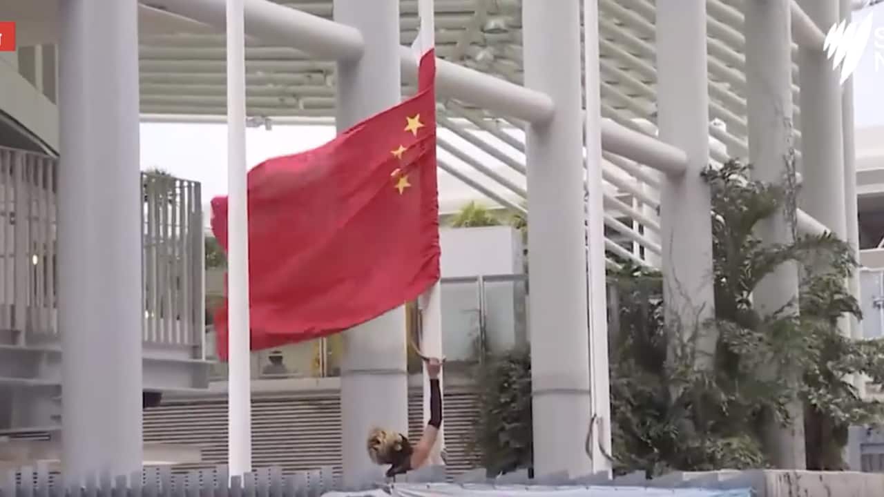 Hong Kong protesters take down and burn Chinese flag