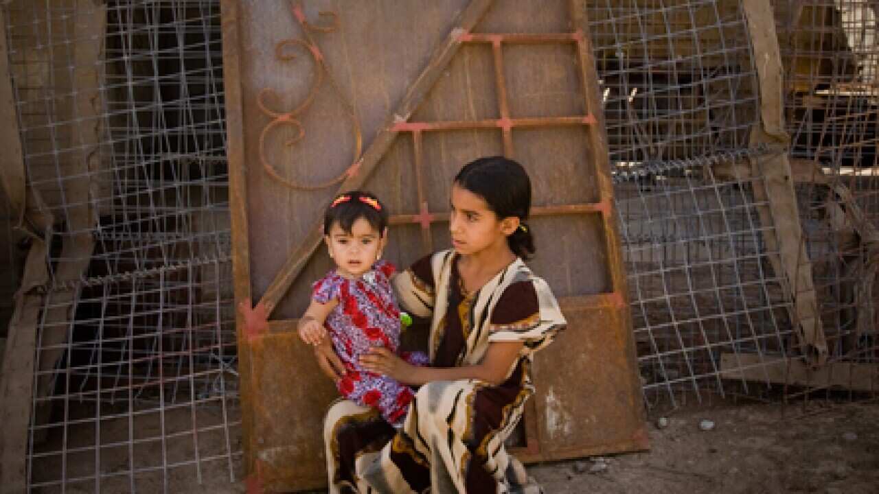 iraq_baby_civilians_101230_B_getty_582055033