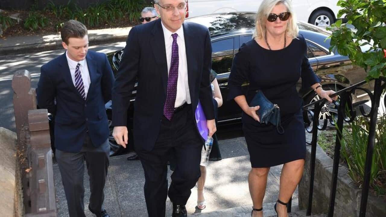 Warwick Fairfax arrives with family members.