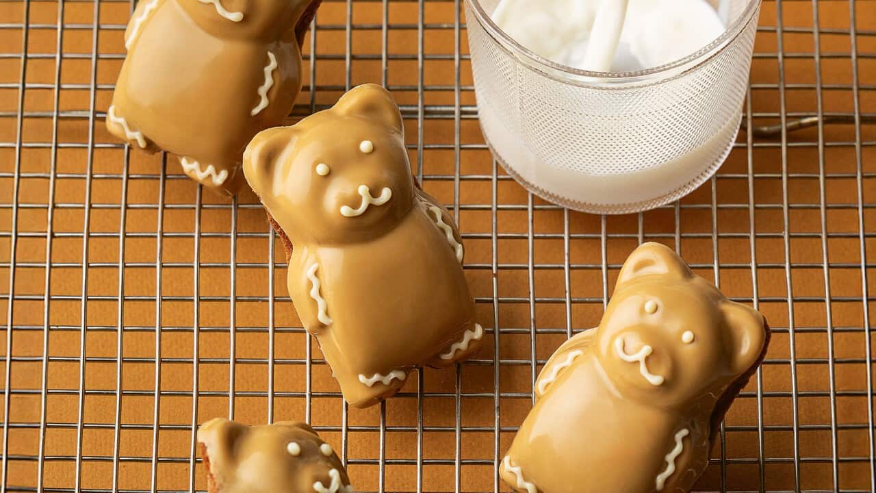 Four playful bear-shaped madeleines, decorated with a caramelised while chocolate covering.
