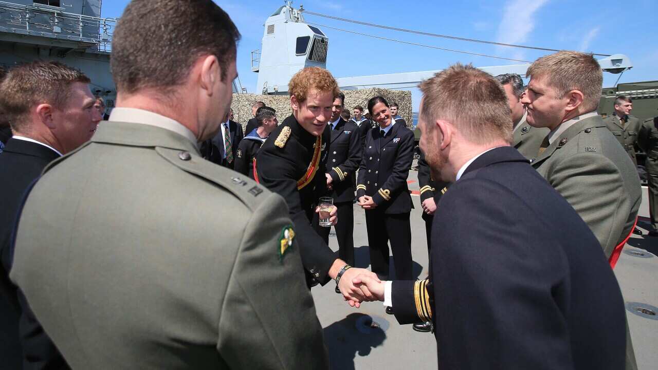 Prince Harry attends a reception on HMS BULWARK with descendants of veterans Gallipoli campaign in WW1, Friday April 24, 2015. (Niall Carson/PA Wire)