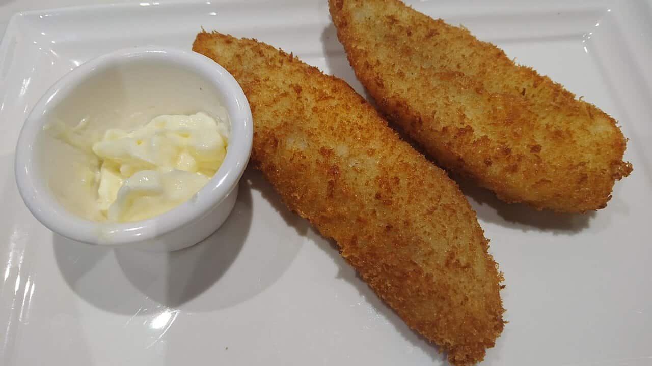 炸香酥魚塊,伴以沙律醬來吃,十分滋味。