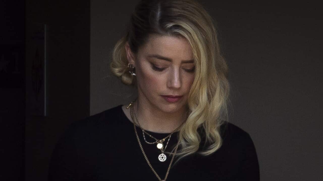 Actress Amber Heard departs the Fairfax County Courthouse following the verdicts in her trial against Johnny Depp