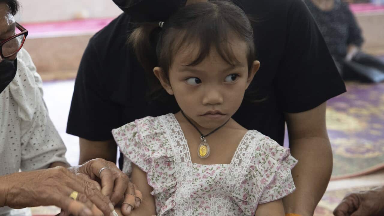 A girl wearing a dress