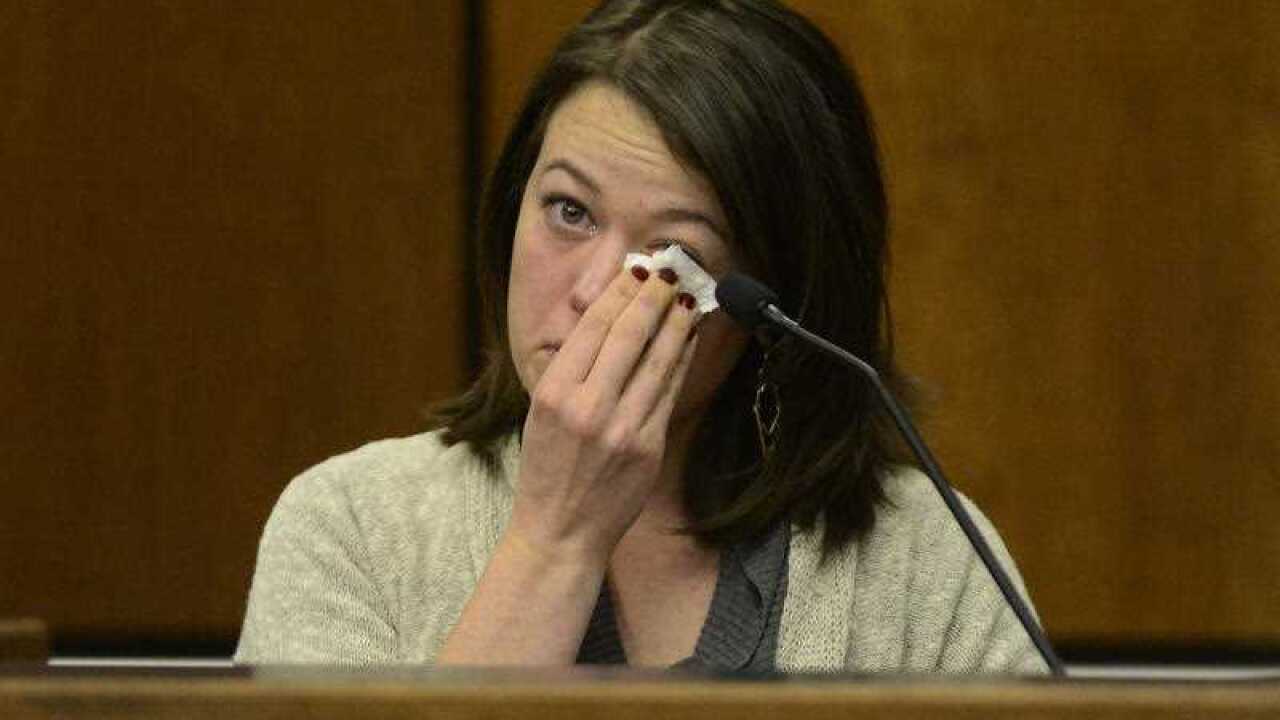 Michelle Wilkins, who had her baby cut from her womb by someone she just met, testified Wednesday she told herself she had to survive for the sake of her unborn daughter.