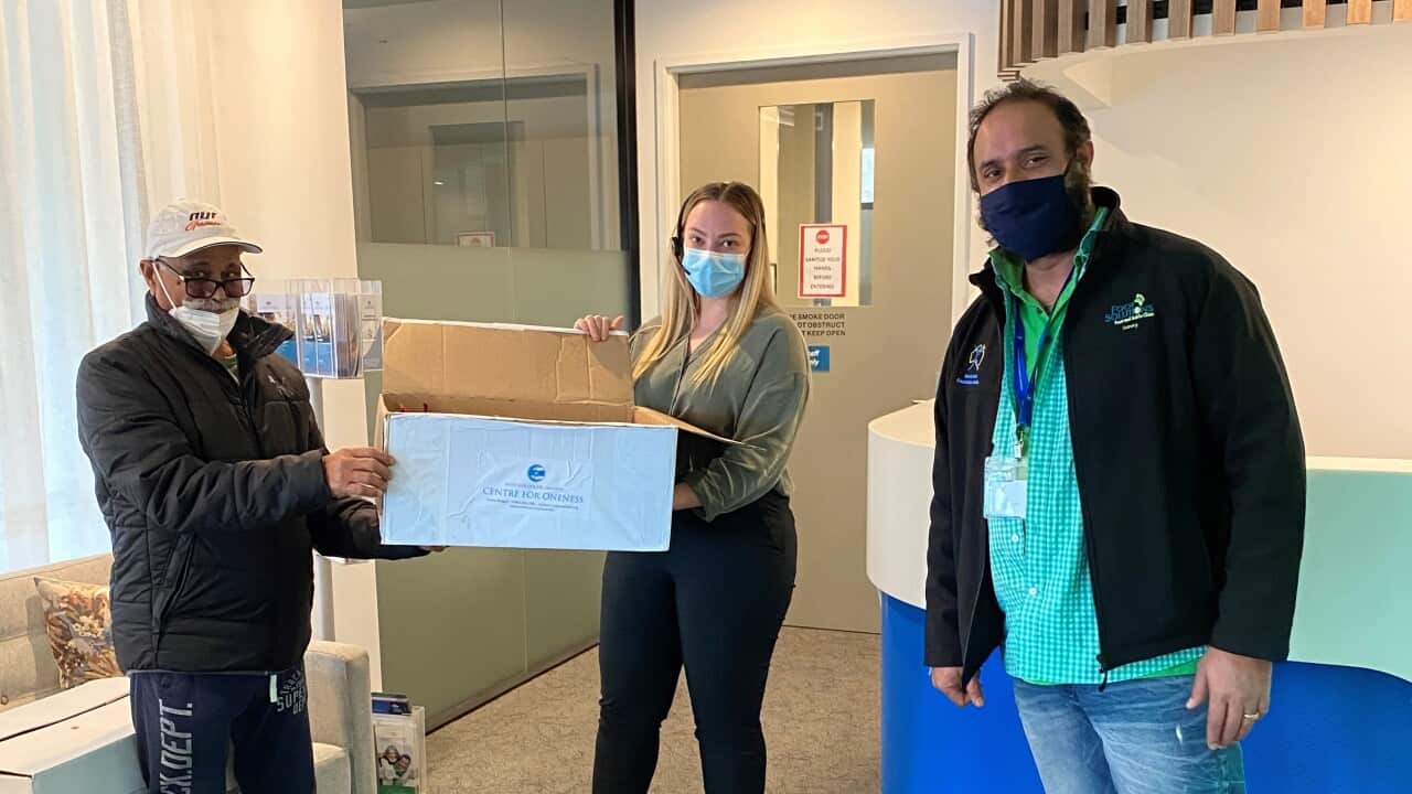 Sunny Duggal (extreme right) with representatives of Nirankari Mission handing over essential food items to various community centres in Melbourne