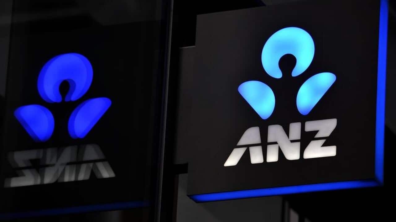 The ANZ Bank logo is seen at one of its branches in Sydney.