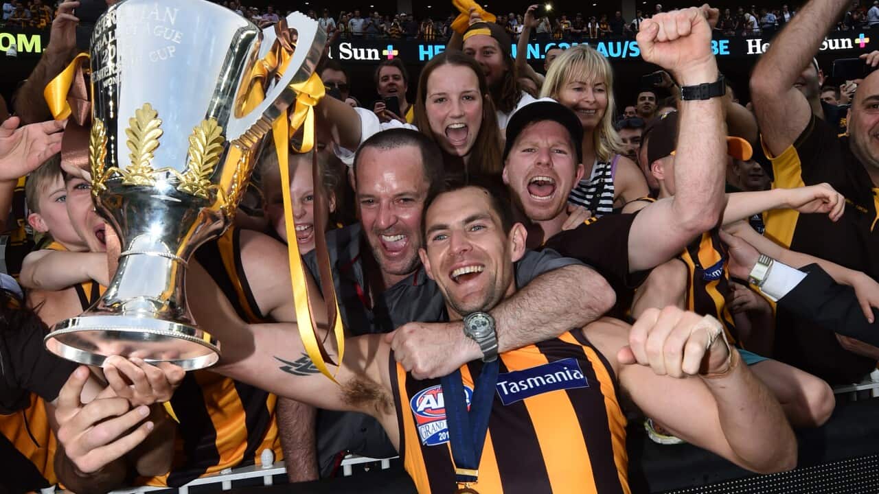 Hawthorn Hawks captain Luke Hodge celebrates winning the AFL Grand Final against the West Coast Eagles at the MCG