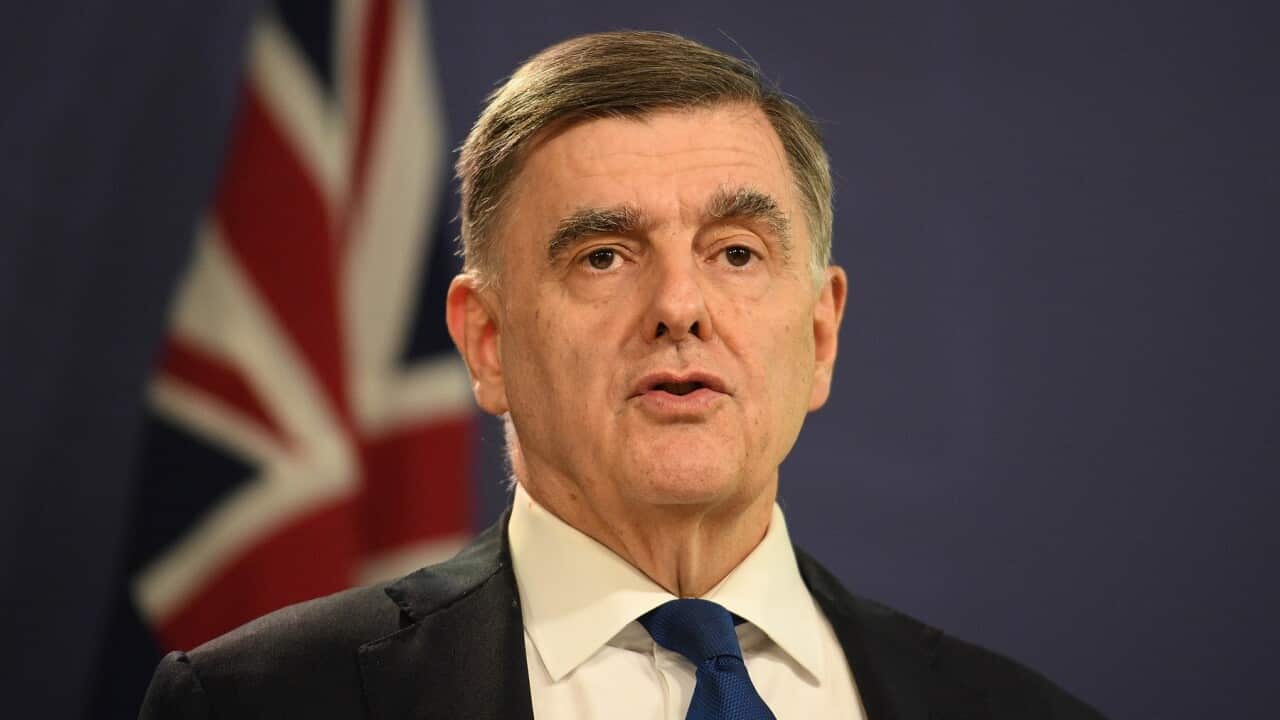 Dr. Brendan Murphy, Secretary of the Department of Health joins Prime Minister Scott Morrison during a press conference in Sydney, Friday, March 5, 2021. (AAP Image/Dean Lewins) NO ARCHIVING