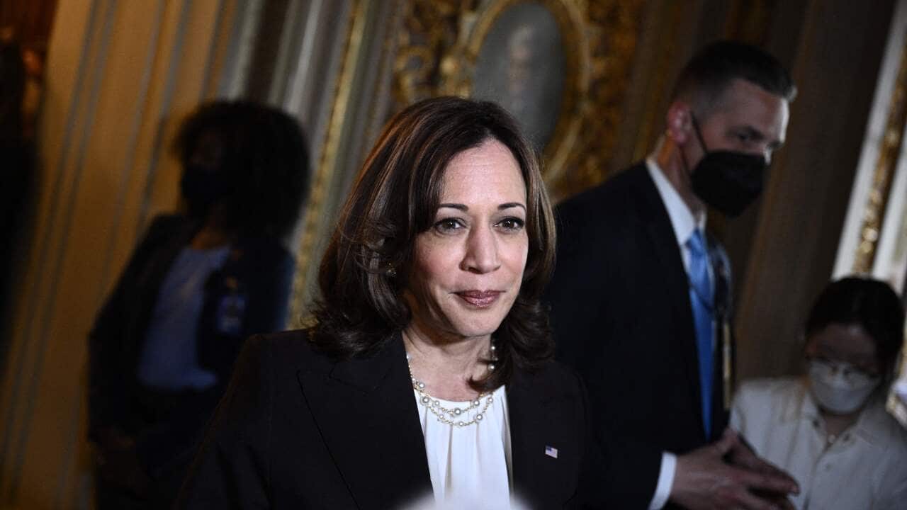 US Vice President Kamala Harris speaks to reporters while departing the Senate Chamber at the US Capitol in Washington, DC.