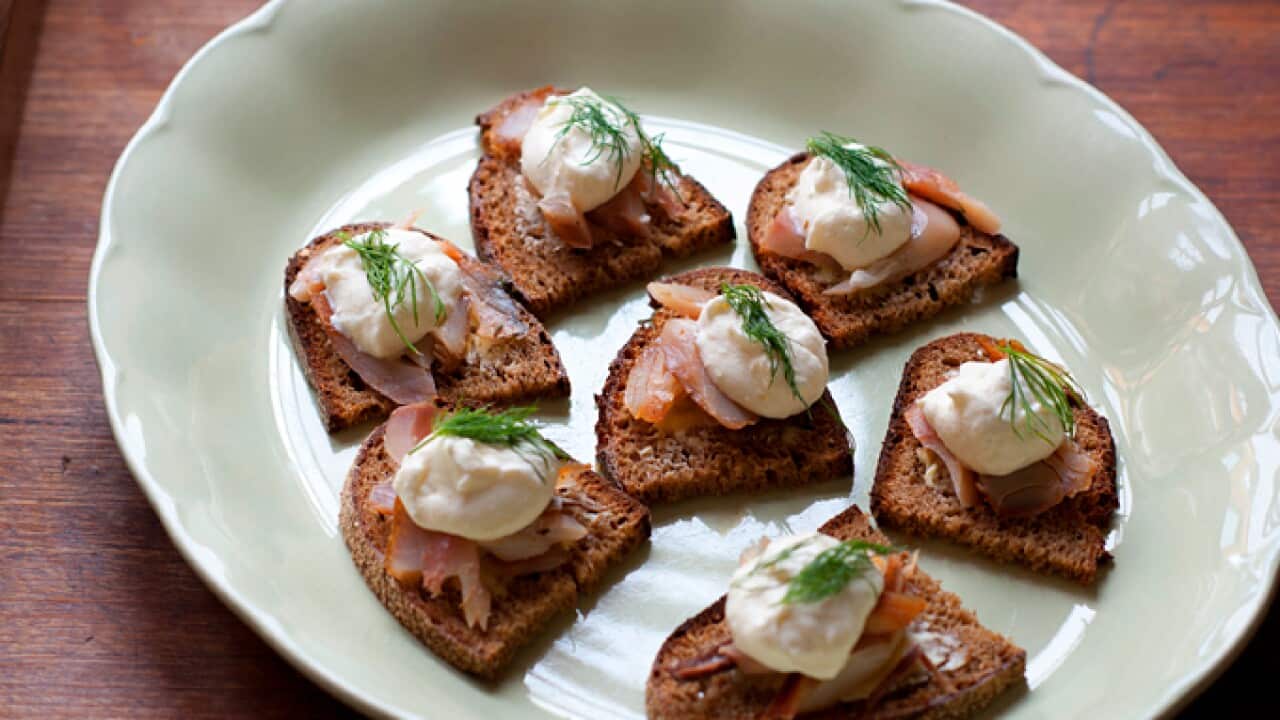 Open sandwiches of smoked fish and horseradish cream