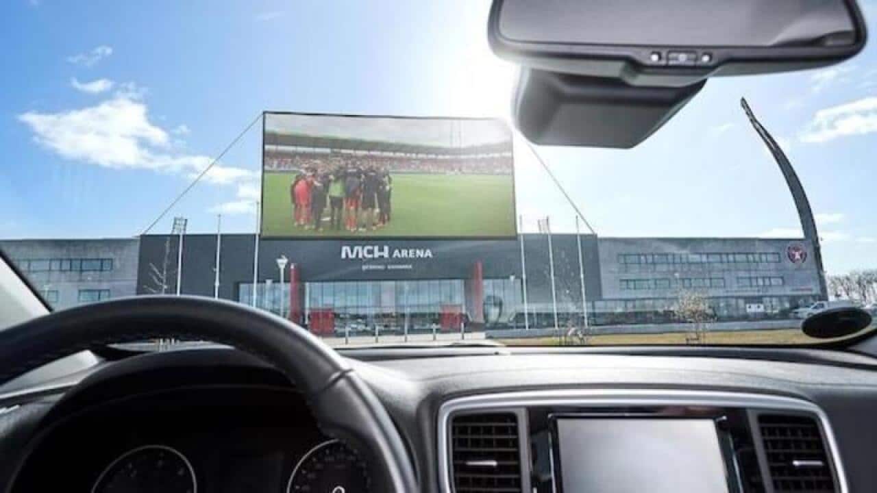 Drive in watiching football