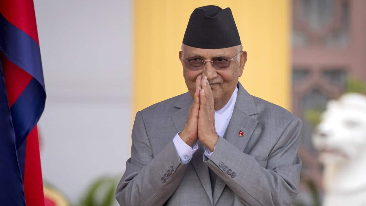Newly elected Prime Minister Khadga Prasad Oli greets after the oath of office in President residence in Kathmandu, Nepal on Monday, 15 July 2024.