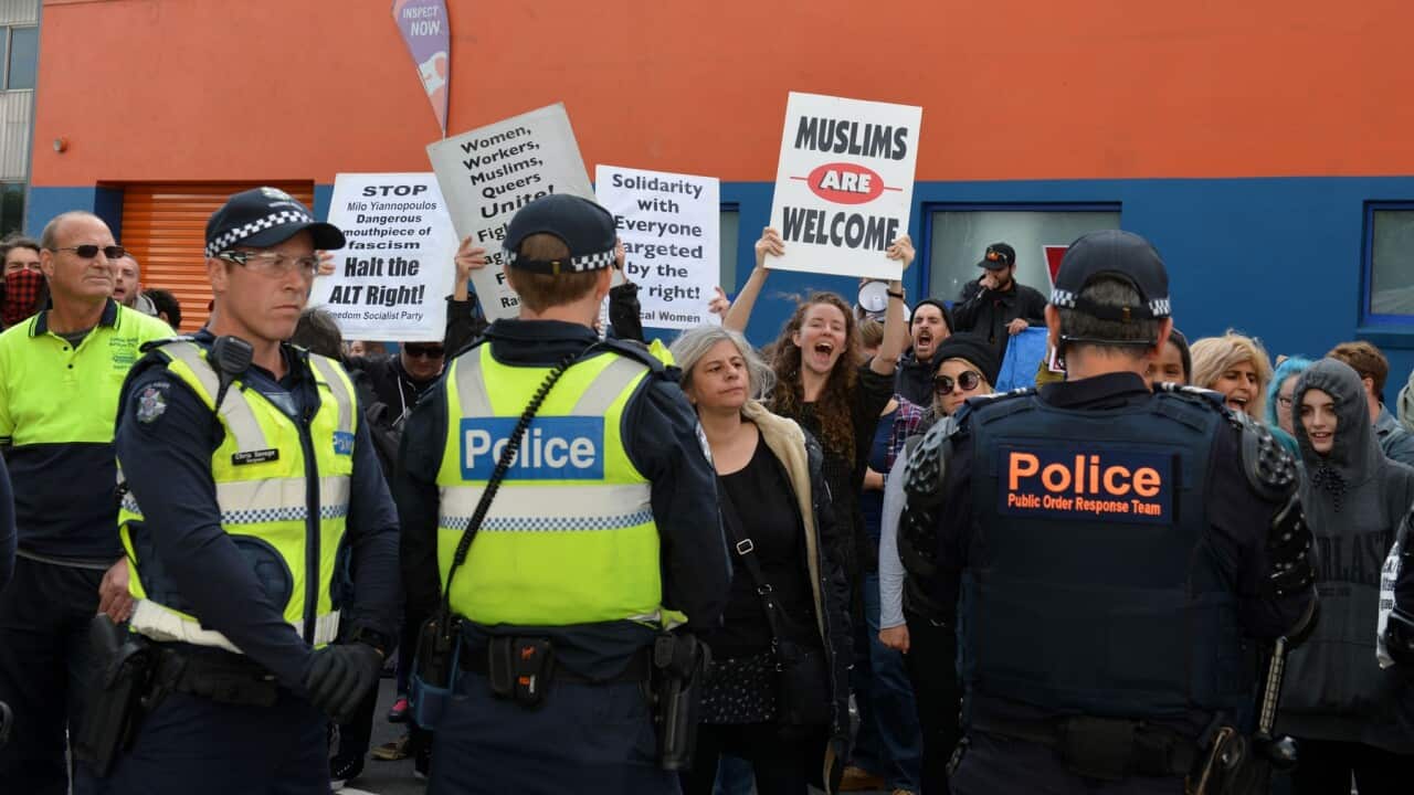 Anti-racism protestors face police at an event in Melbourne in 2017