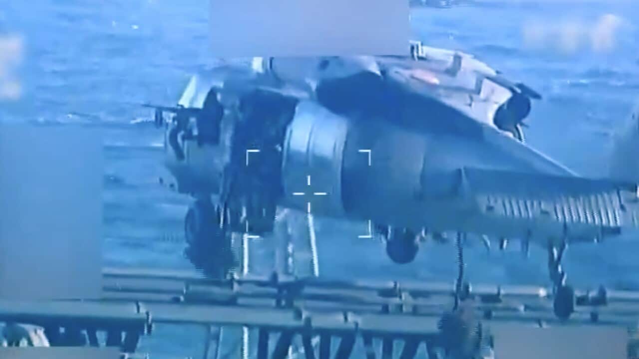 This image from video posted on Attorney General Pam Bondi's X account, and partially redacted by the source, shows an oil tanker being seized by U.S. forces off the coast of Venezuela.