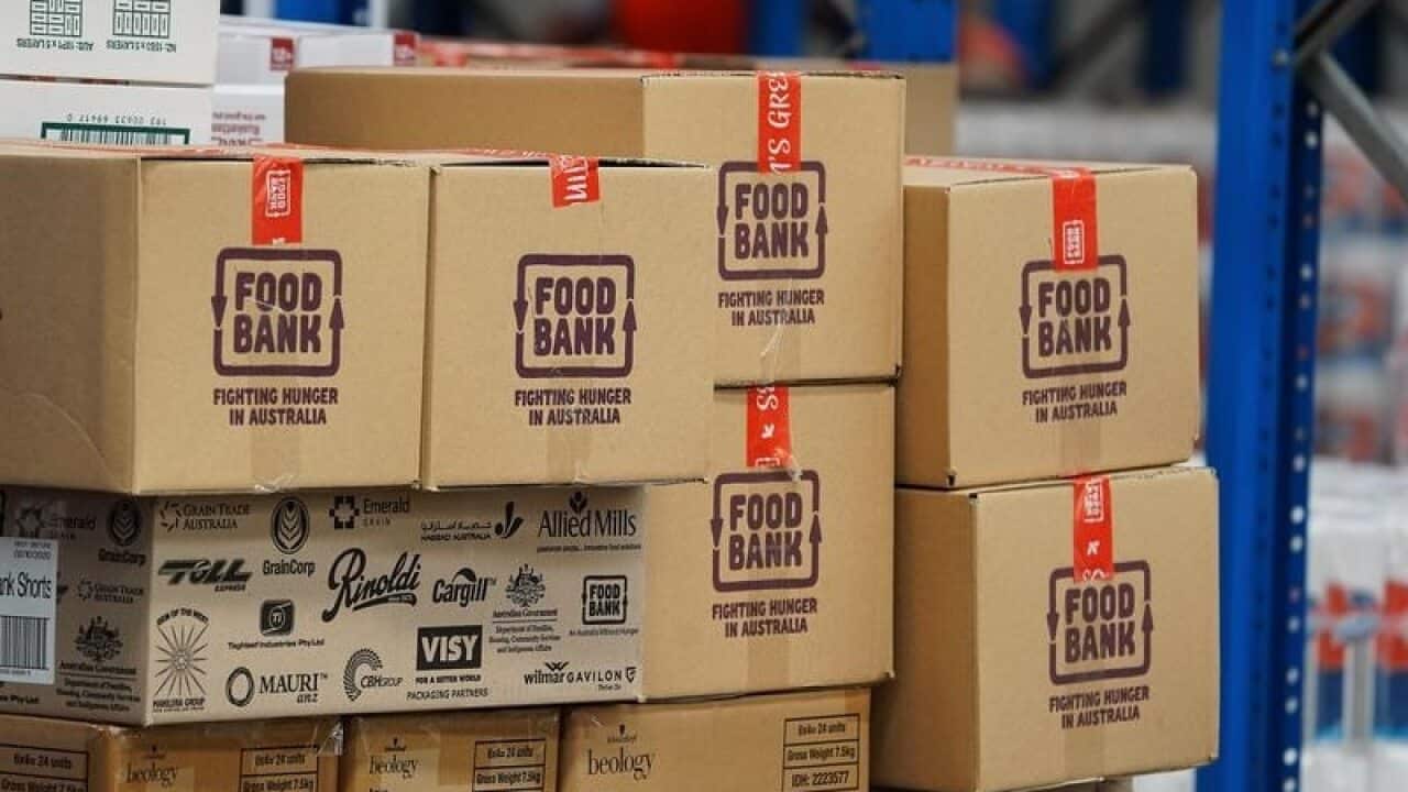 A funding cut to Foodbank has been reversed so it can continue supplying basic food to needy people.